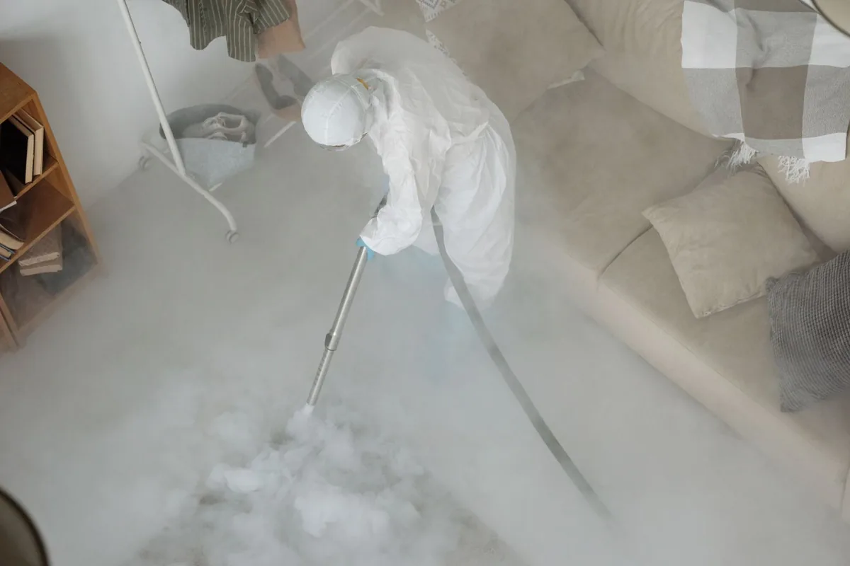Biohazard cleanup technician in protective equipment, Turners Falls, MA